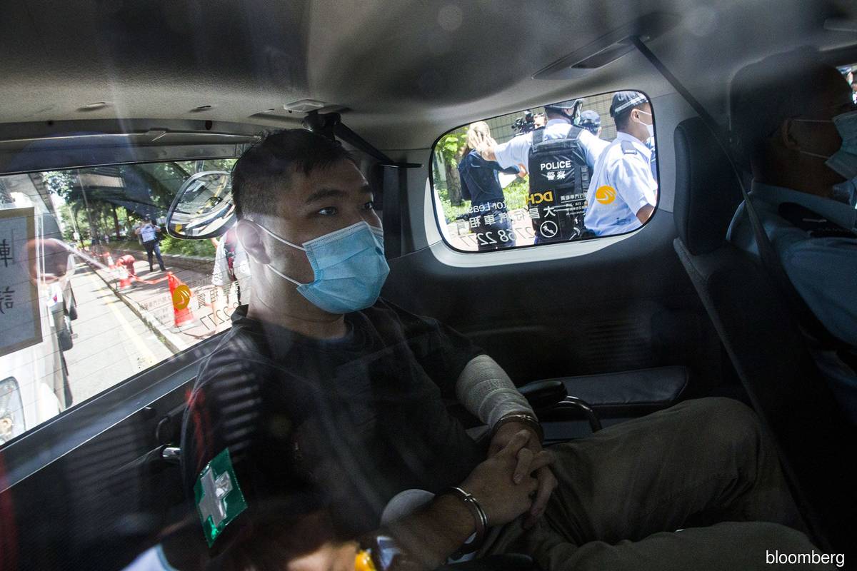 Hong Kong man jailed for nine years in first national security case